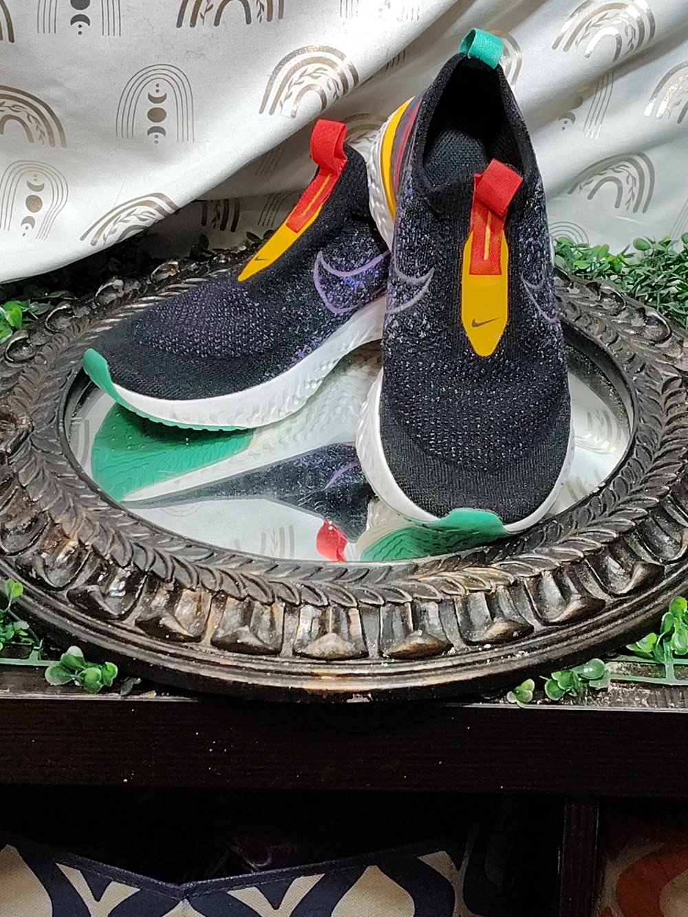 Nike Slip-On Knit Sneakers in Black with Yellow, Red, Purple & Green Accents